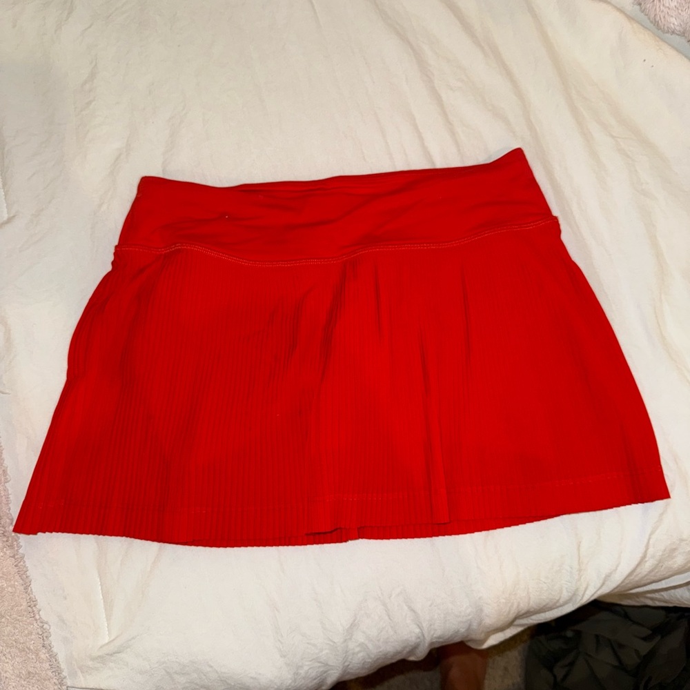Lululemon Red pleated skirt. Worn once maybe. Great condition. Style not sold